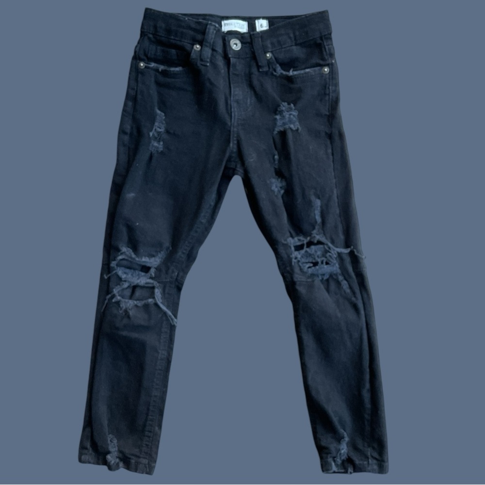 Evolution in Design distressed skinny jeans